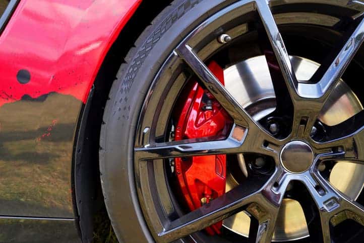 Alloy wheel with calipers and racing brakes of the sport car